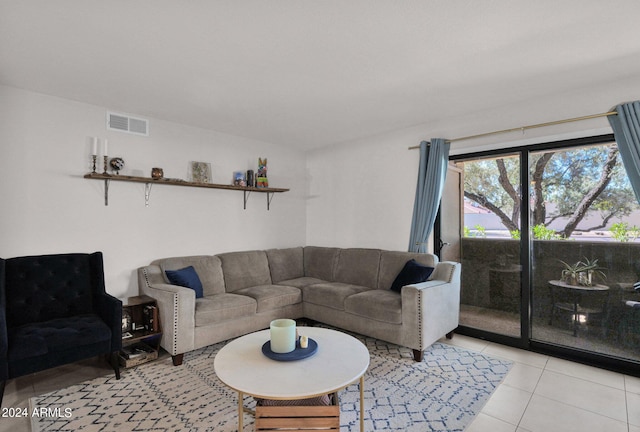 living room with light tile patterned floors