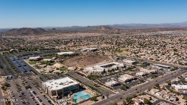 birds eye view of property featuring a mountain view