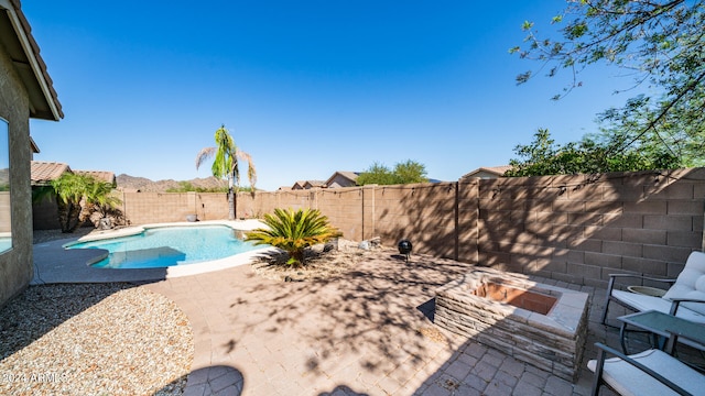 view of pool with a patio area