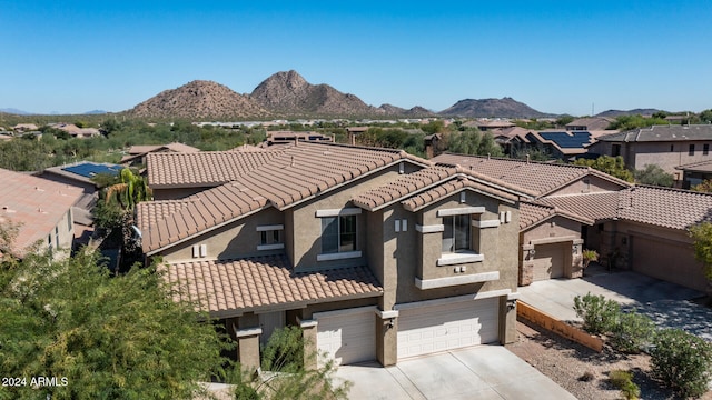 exterior space featuring a mountain view