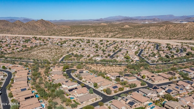 drone / aerial view featuring a mountain view