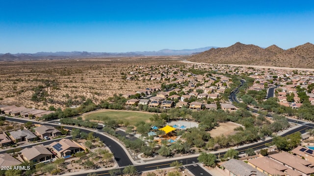 birds eye view of property featuring a mountain view