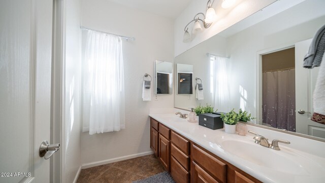 bathroom featuring vanity and tile patterned floors