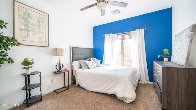 carpeted bedroom with ceiling fan