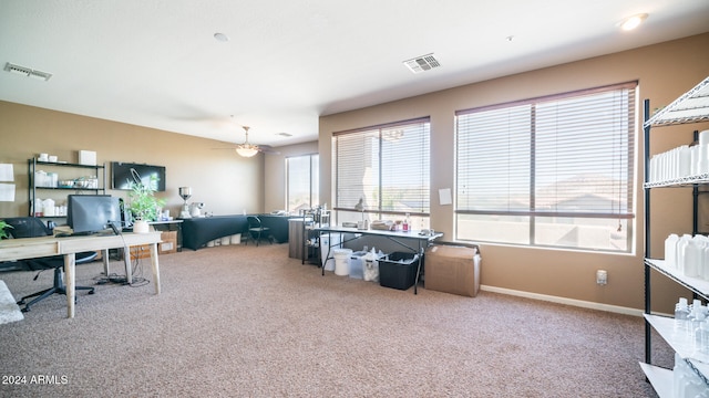 office with carpet flooring and ceiling fan