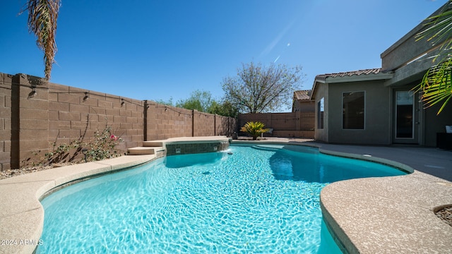 view of swimming pool featuring a patio