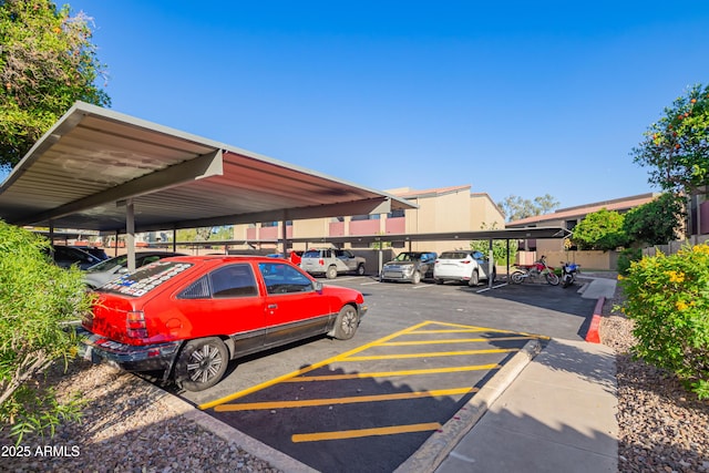 view of partially covered parking lot