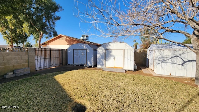 view of yard with a storage unit