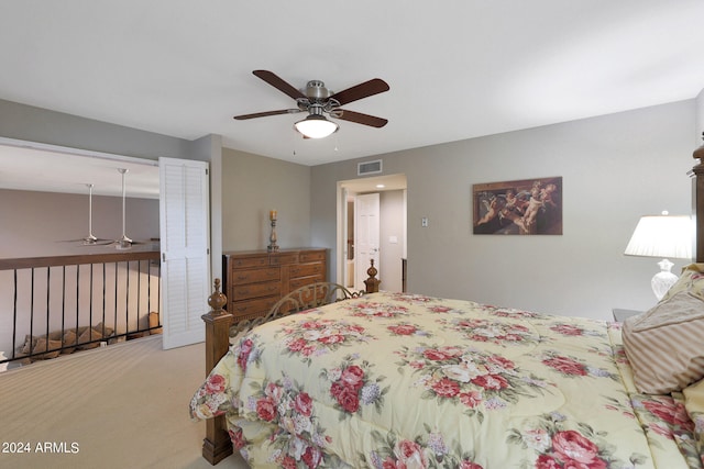 carpeted bedroom featuring ceiling fan