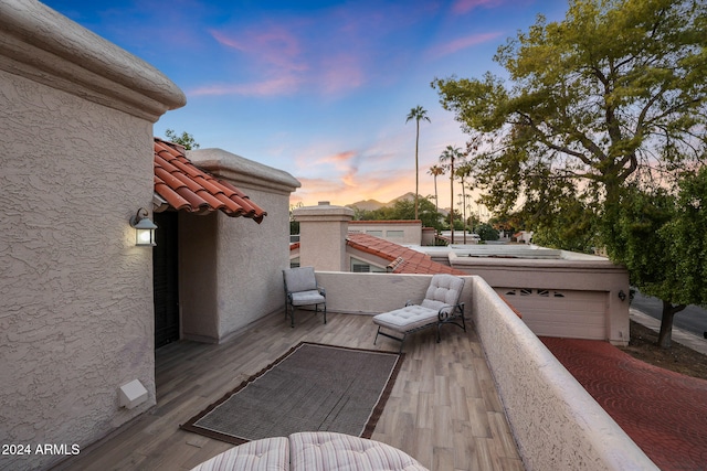 view of patio terrace at dusk