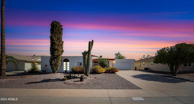 view of front of property with a garage