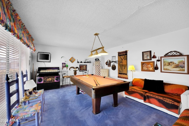 playroom with dark colored carpet, pool table, and a textured ceiling