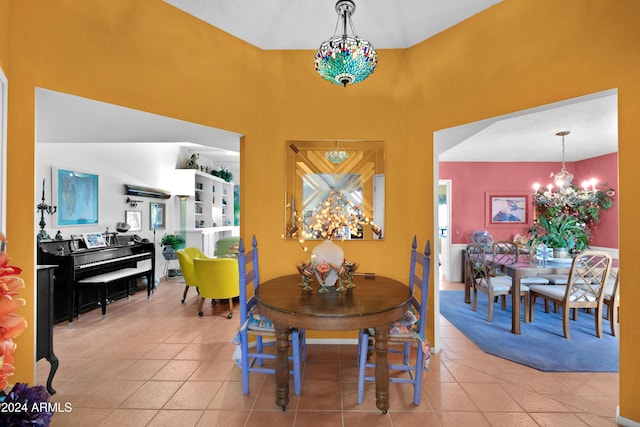 tiled dining room with a towering ceiling and a chandelier