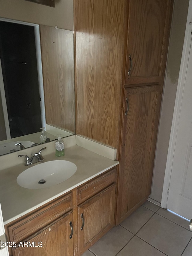 bathroom with vanity and tile patterned floors