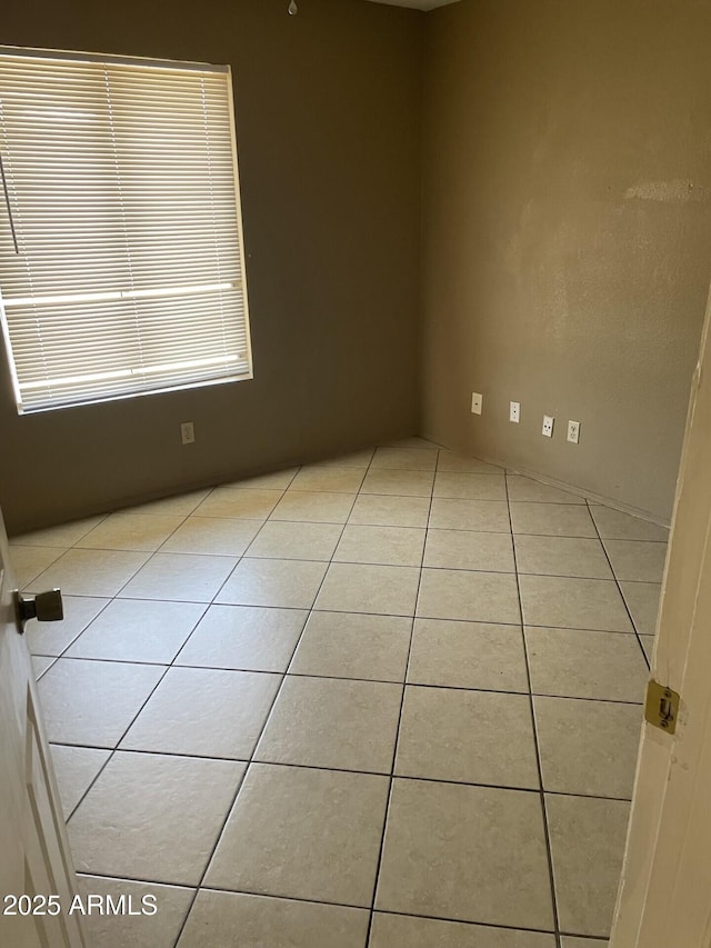 view of tiled empty room