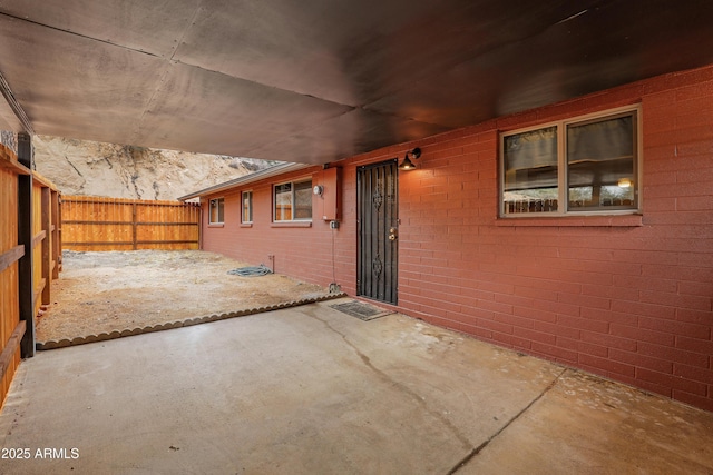 property entrance with a patio