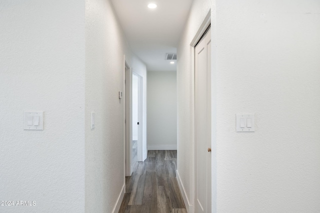 unfurnished bedroom featuring ceiling fan and dark hardwood / wood-style floors