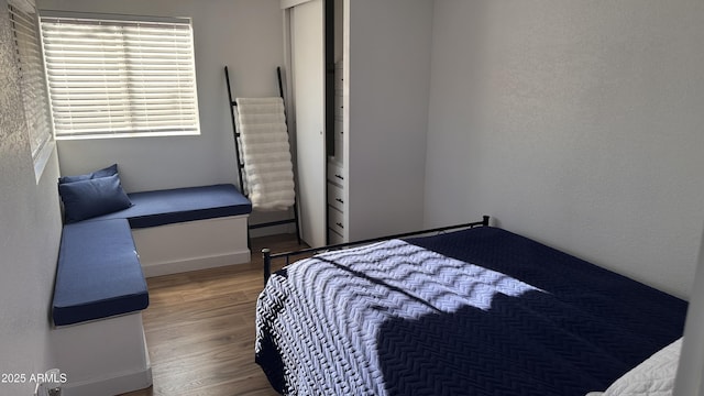 bedroom featuring hardwood / wood-style flooring