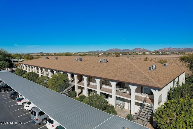 drone / aerial view featuring a mountain view