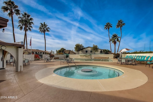 view of pool featuring a patio area