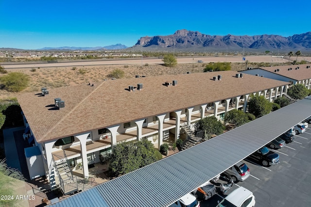 drone / aerial view featuring a mountain view