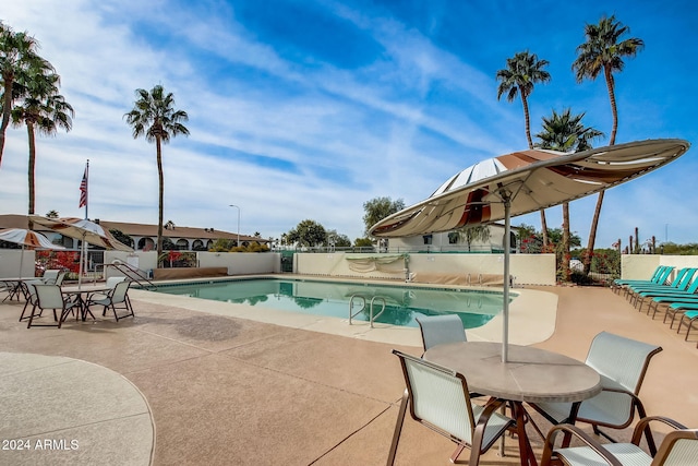 view of pool featuring a patio area