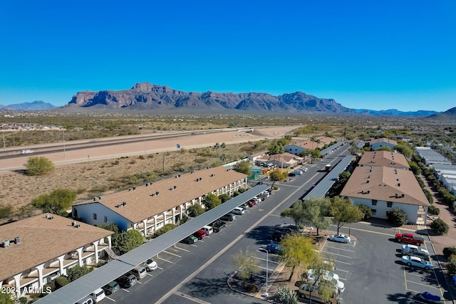 birds eye view of property featuring a mountain view