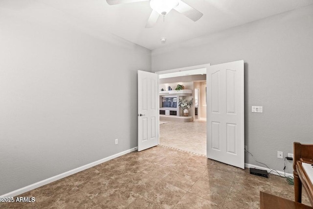 spare room with ceiling fan