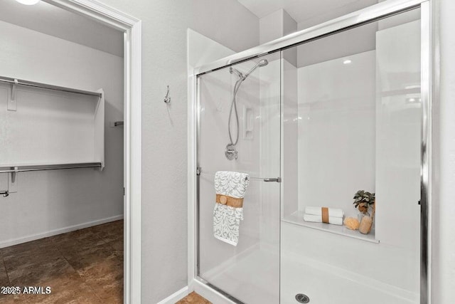 bathroom featuring walk in shower