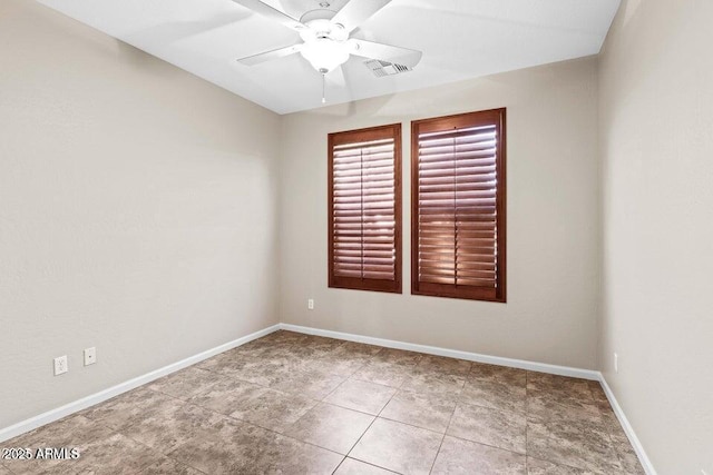 empty room featuring ceiling fan