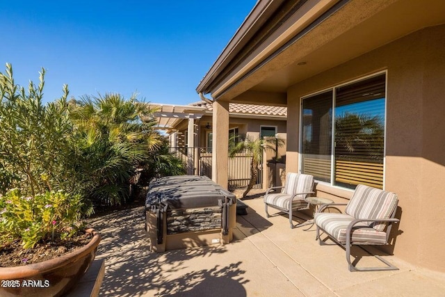 view of patio featuring a pergola