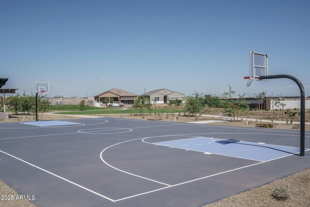 view of basketball court with community basketball court and a gazebo