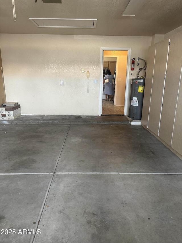 garage featuring electric water heater