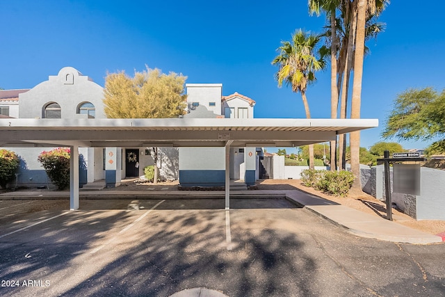 view of car parking with a carport