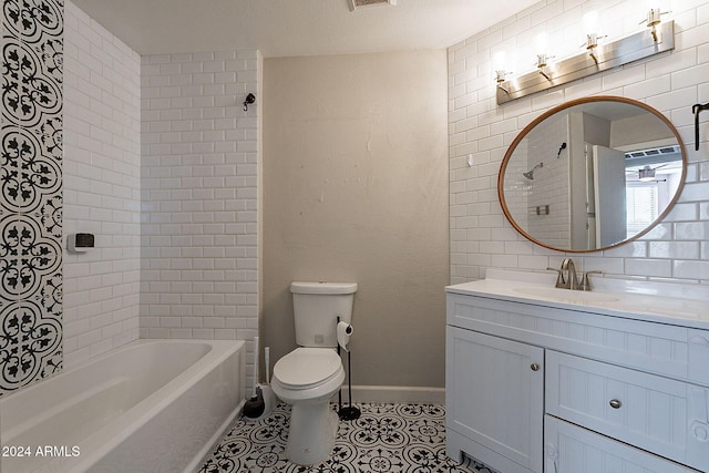 full bathroom with toilet, tiled shower / bath combo, vanity, and backsplash