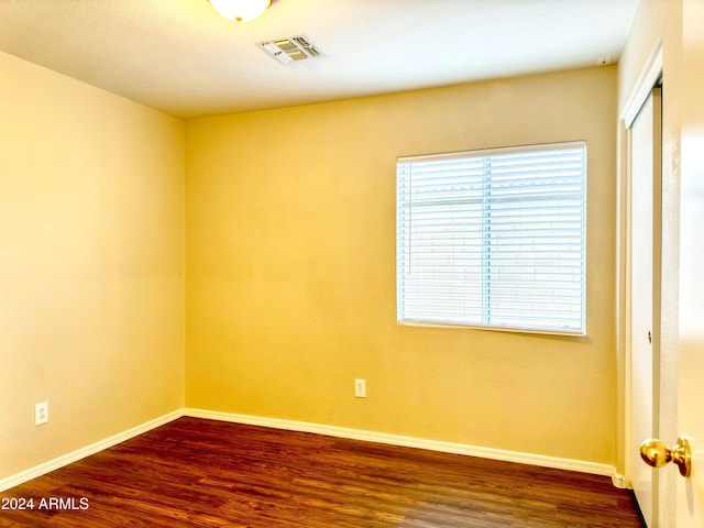 empty room featuring hardwood / wood-style flooring