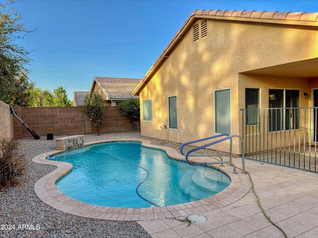 view of pool with a patio