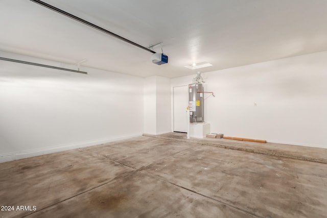 garage featuring gas water heater and a garage door opener