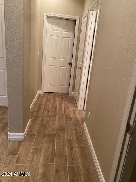 hall featuring dark hardwood / wood-style floors