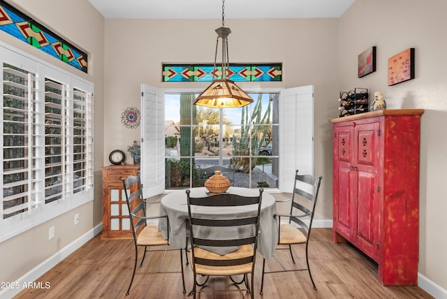 dining room with light hardwood / wood-style flooring