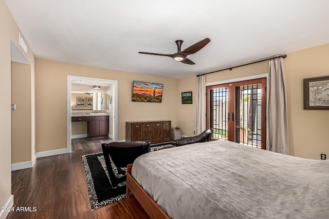 bedroom featuring access to exterior, dark hardwood / wood-style flooring, ceiling fan, and connected bathroom