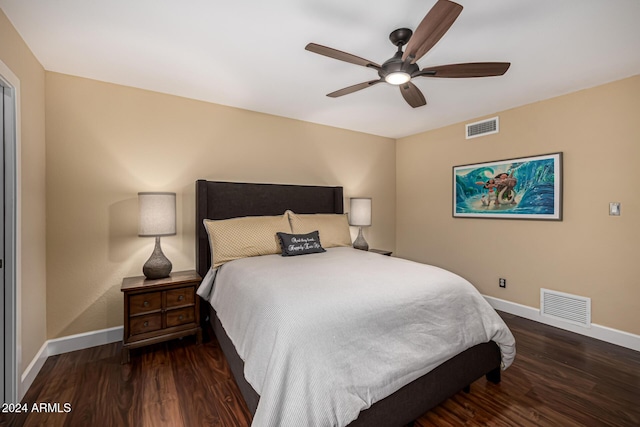 bedroom featuring ceiling fan and dark wood-type flooring