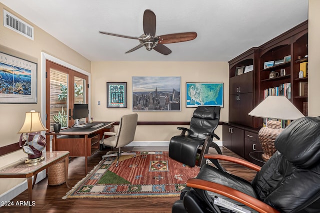 office space with ceiling fan and dark wood-type flooring