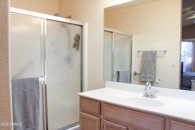 bathroom featuring vanity and walk in shower