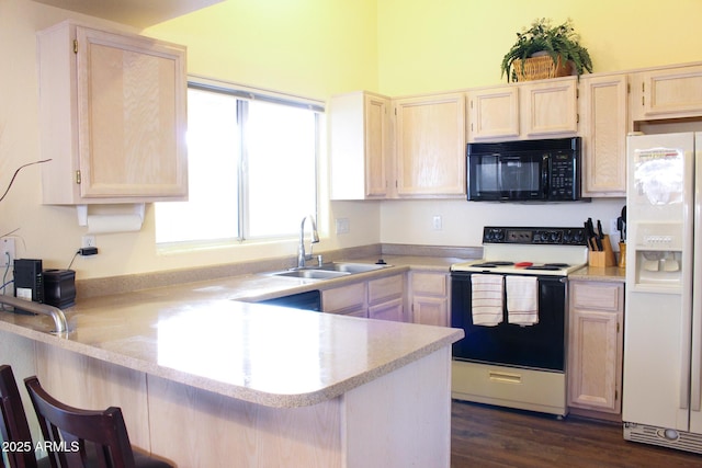 kitchen with electric range oven, sink, white fridge with ice dispenser, kitchen peninsula, and dark wood-type flooring