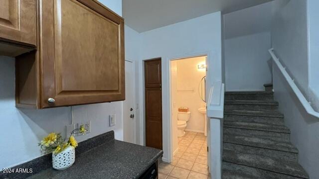 interior space featuring light tile patterned flooring