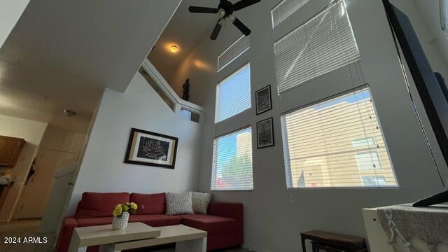 living room featuring ceiling fan