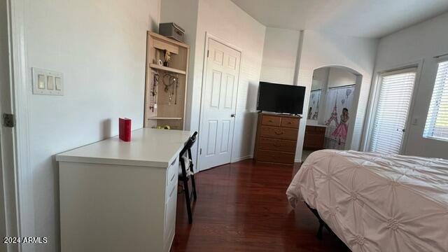 bedroom featuring dark hardwood / wood-style floors