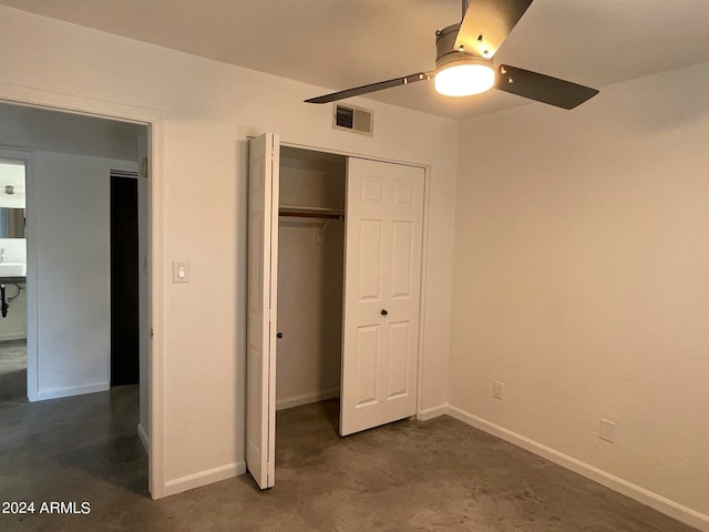 unfurnished bedroom with a closet and ceiling fan