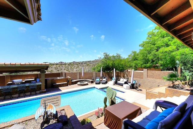 11215 N Garland Cir, Fountain Hills, AZ 85268 - view of pool featuring a fenced in pool, an outdoor living space with a fire pit, a fenced backyard, and area for grilling